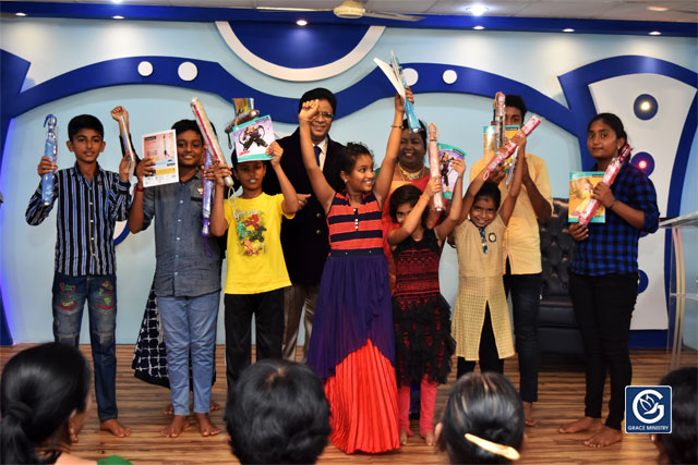 About Ten Poor and needy Students from Various Schools and Colleges of Mangalore brightened up as they received books, umbrellas and Education Scholarship from Grace Ministry on Sunday, June 16th, 2019. 